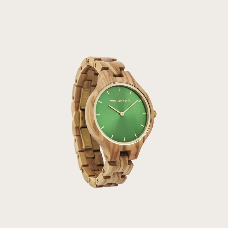 The AURORA Collection breaths the fresh air of Scandinavian nature and the astonishing views of the sky. This light weighing watch is made of olive wood, accompanied by a green stainless-steel dial with golden details.<br />
The watch is available with a wooden