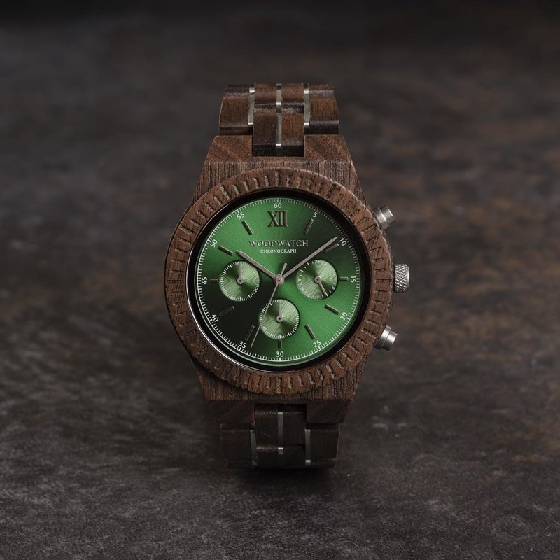 Prepare for adventure with our fully featured, hand-crafted Chronograph wrist watch. This premium design watch features a 45mm walnut wood case, green stainless steel dial and a SEIKO VD54 movement. The unique new strap combines sustainable walnut wood wi