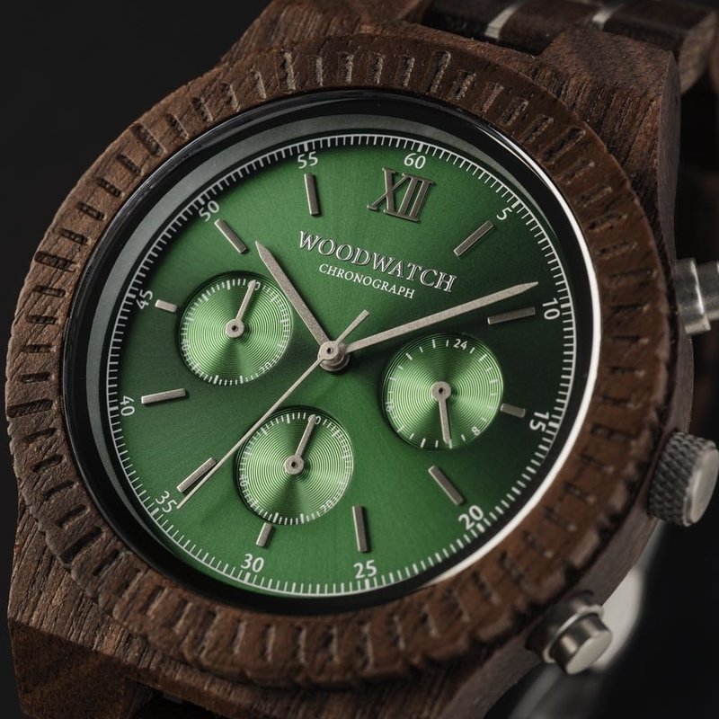 Prepare for adventure with our fully featured, hand-crafted Chronograph wrist watch. This premium design watch features a 45mm walnut wood case, green stainless steel dial and a SEIKO VD54 movement. The unique new strap combines sustainable walnut wood wi