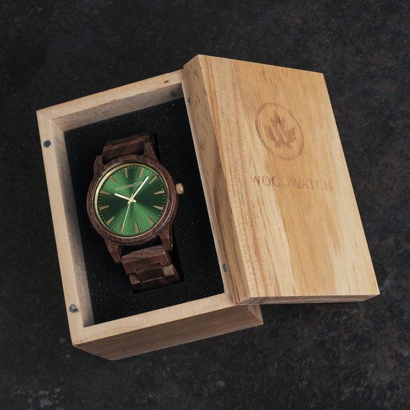 The Camo Walnut features a modernized minimal green dial with bold details in a 45mm case. A wrist essential combining natural wood with stainless steel and sapphire coated glass. The Camo Walnut is handmade from American Walnut Wood.