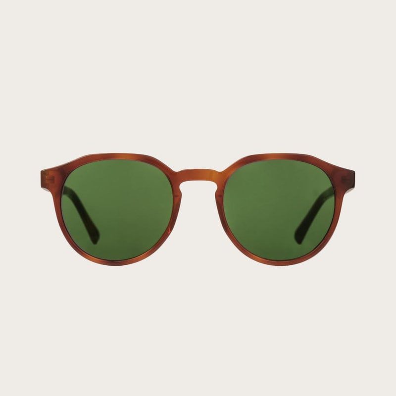 The REVELER Classic Havanas Camo features a sleek geometric dark yellow tortoise frame with green camo lenses. Composed of durable Italian Mazzucchelli bio-acetate with hand-finished natural ebony temples and tortoise acetate tips. Bio-acetate is made fro