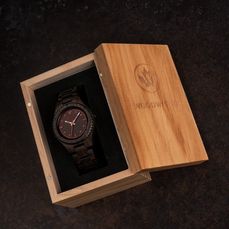The Forester collection breathes nature and simplicity. Experience true freedom with the FORESTER Wildwood, featuring a slim 40mm diameter case, black dial and unique red details. Made from sophisticated Black Sandalwood, this watch is a perfect companion