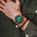 Prepare for adventure with our fully featured, hand-crafted Chronograph wrist watch. This premium design watch features a 45mm walnut wood case, green stainless steel dial and a SEIKO VD54 movement. The unique new strap combines sustainable walnut wood wi