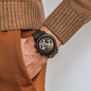 The CHRONUS Dark Eclipse Khaki features a classic SEIKO VD54 chronograph movement, scratch resistant sapphire coated glass and stainless steel enforced strap links. The watch is made of green sandalwood and has a black dial with golden details. Handcrafte
