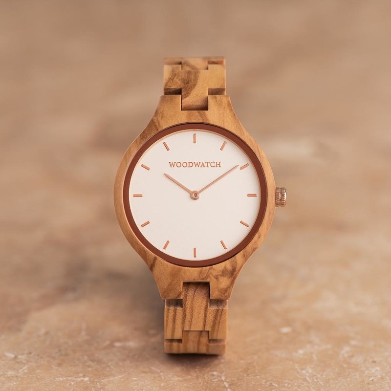 The AURORA Collection breaths the fresh air of Scandinavian nature and the astonishing views of the sky. This light weighing watch is made of European Olive Wood, accompanied by a light stainless-steel dial with a rose gold highlight and shining rose gold