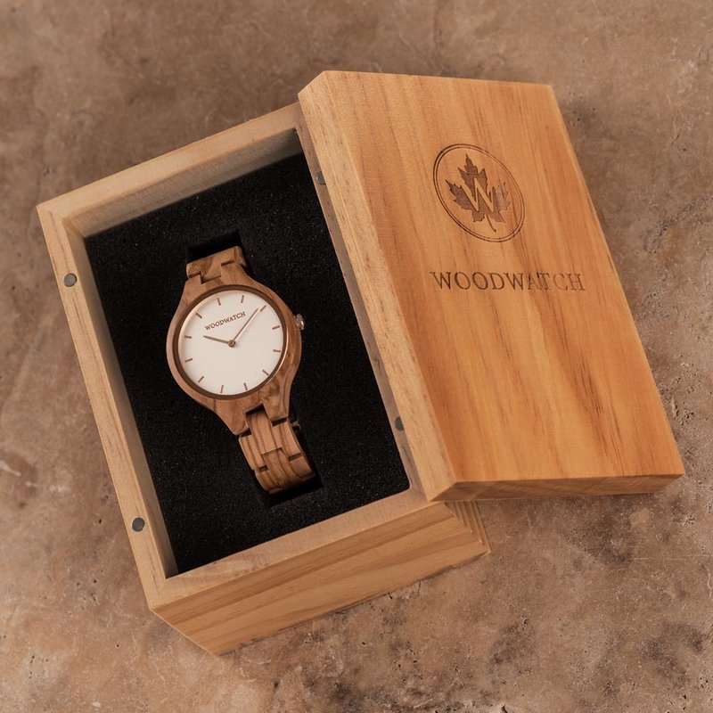 The AURORA Collection breaths the fresh air of Scandinavian nature and the astonishing views of the sky. This light weighing watch is made of European Olive Wood, accompanied by a light stainless-steel dial with a rose gold highlight and shining rose gold