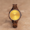 The AURORA Collection breaths the fresh air of Scandinavian nature and the astonishing views of the sky. This light weighing watch is made of East African zebra wood, accompanied by a yellow stainless-steel dial with silver details.The watch is available