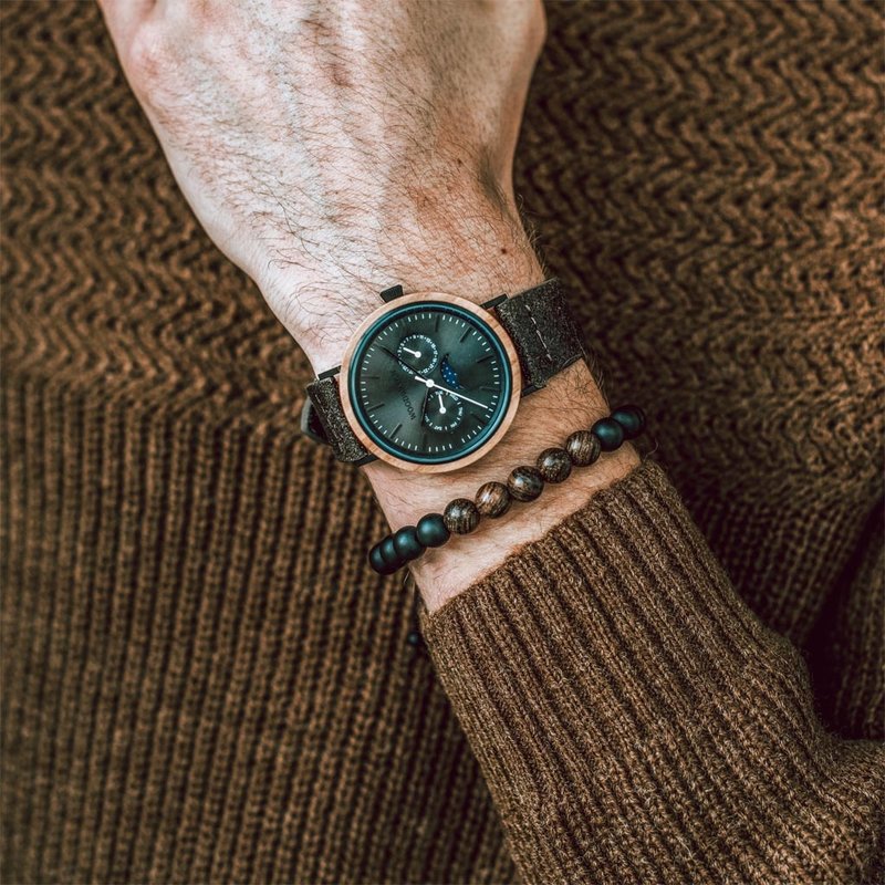 Our handmade Rosewood Volcanic Beads Bracelet features a combination of 8mm Rosewood and Volcanic beads. This bracelet is adjustable and fits most wrist sizes. The perfect accessory to go with any WoodWatch.