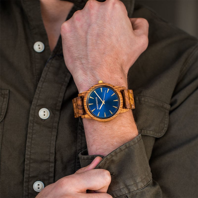 The Astro Kosso features a modernized minimal blue dial with bold details in a 45mm case. A wrist essential combining natural wood with stainless steel and sapphire coated glass. The Astro Kosso is handmade from natural Kosso wood from East Africa.