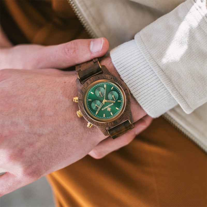 The CHRONUS Collection features a classic SEIKO VD54 chronograph movement, scratch resistant sapphire coated glass and stainless steel enforced strap links. The CHRONUS Emerald Gold is made of American walnut wood and has a green dial with golden details.