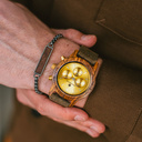 The CHRONUS Collection features a classic SEIKO VD54 chronograph movement, scratch resistant sapphire coated glass and stainless steel enforced strap links. The CHRONUS Tuscany Rise Khaki is made of Kosso Wood from East Africa, and features a yellow dial.