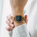 The CITY Skylight features a 30mm square case with a blue dial and golden details. The watch band consists of natural zebra wood that has been hand-finished to perfection and to create our latest small-band design.