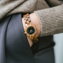 The Juniper watch from the FLORA Collection consists of Zebra wood that has been hand-crafted to its finest slenderness. The Juniper features a dark navy blue dial with golden coloured details.