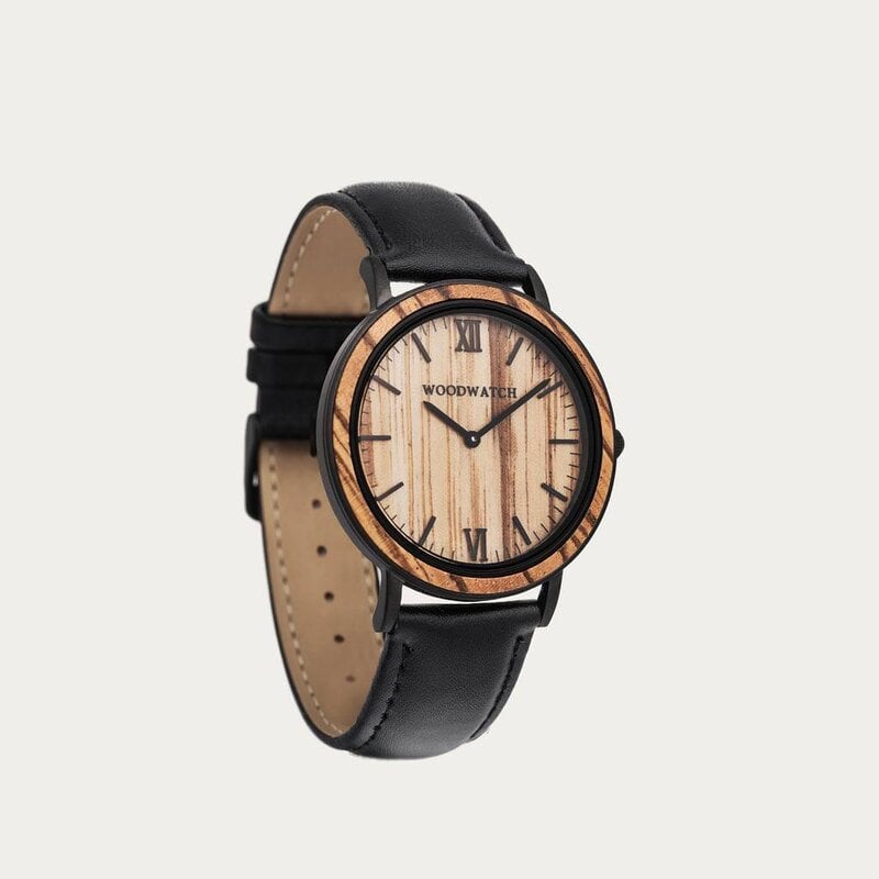 A combination of unique materials with a minimal design to create a timeless look. This modern watch suits both your casual day look and your finest formal wear. A super thin case made of the finest stainless steel with a matte black finish. A statement o