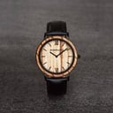 A combination of unique materials with a minimal design to create a timeless look. This modern watch suits both your casual day look and your finest formal wear. A super thin case made of the finest stainless steel with a matte black finish. A statement o