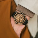 A combination of unique materials with a minimal design to create a timeless look. This modern watch suits both your casual day look and your finest formal wear. A super thin case made of the finest stainless steel with a matte black finish. A statement o