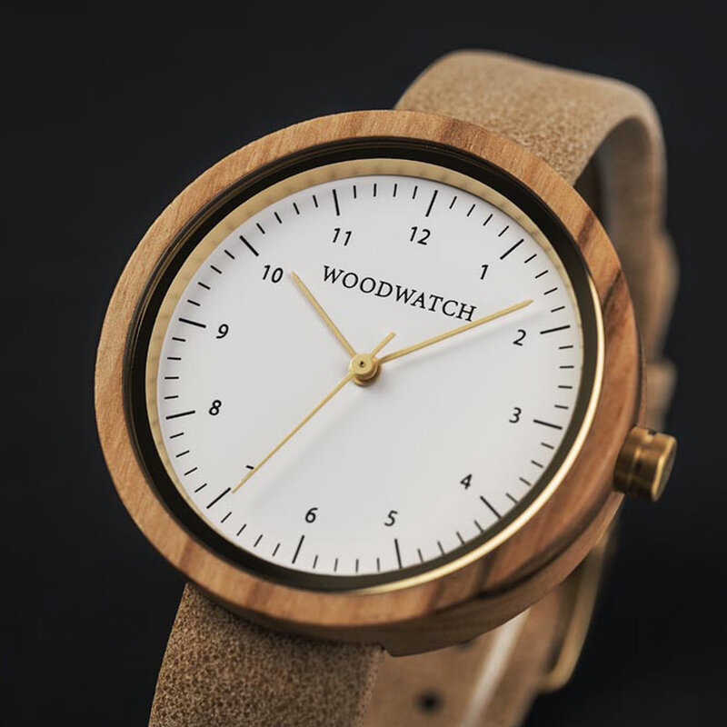 Inspired by contemporary Nordic minimalism. The NORDIC Copenhagen features a 36mm diameter white olive wood case with a white dial and gold details. Handmade from sustainably sourced wood and combined with an ultra soft beige sustainable vegan leather str