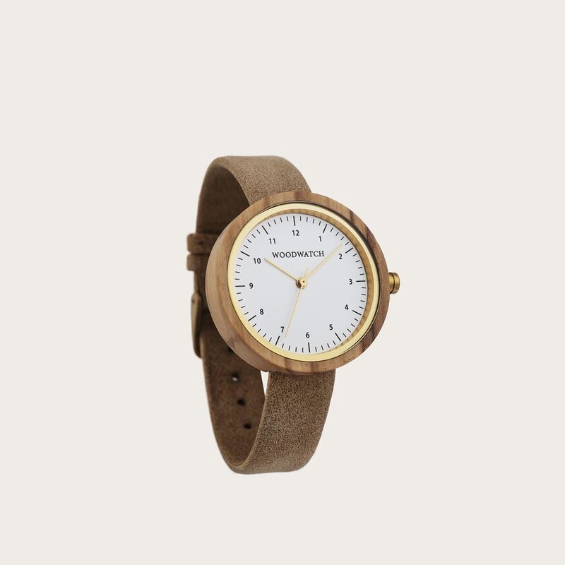 Inspired by contemporary Nordic minimalism. The NORDIC Copenhagen features a 36mm diameter white olive wood case with a white dial and gold details. Handmade from sustainably sourced wood and combined with an ultra soft beige sustainable vegan leather str