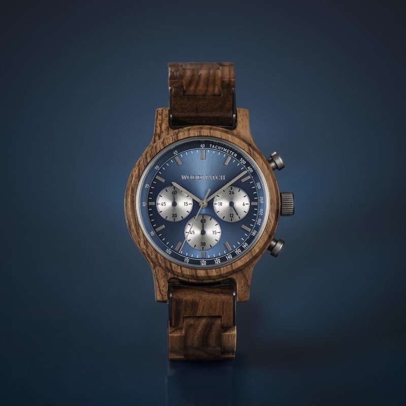 The Chrono Mariner Kosso is made from kosso wood and features a double layered blue dial with silver details.