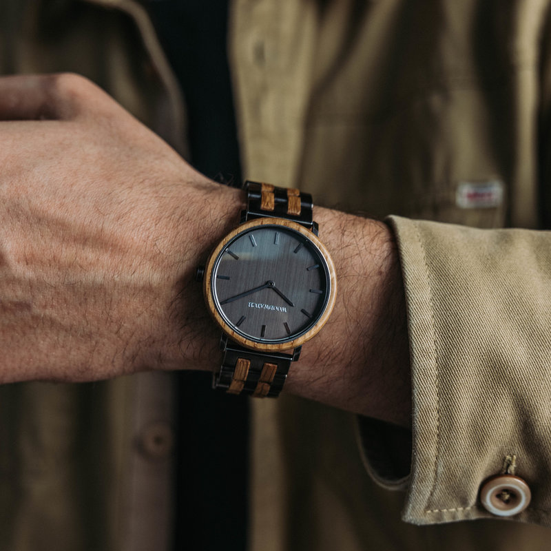 This exclusive WoodWatch features an oakwood bezel made from reclaimed bourbon whiskey barrels from Kentucky, United States. A limited edition of 208 pieces, a reference to the number of weeks the whiskey was aged in the barrel that this watch comes from.