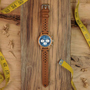 The Chrono Mariner Kosso is made from kosso wood and features a double layered blue dial with silver details.