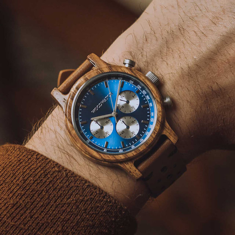 The Chrono Mariner Kosso is made from kosso wood and features a double layered blue dial with silver details.