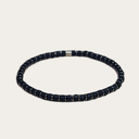 Handmade natural stone bracelet from black agate. Features 4mm sliced beads and a stainless steel accent. Made with a quality stretch cord to easily put it on and take it off.