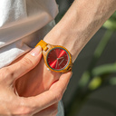 The AURORA Collection breaths the fresh air of Scandinavian nature and the astonishing views of the sky. This light weighing watch is made of kosso wood, accompanied by a red stainless-steel dial. Comes with a cactus leather strap in matching light brown,