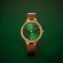 The AURORA Collection breaths the fresh air of Scandinavian nature and the astonishing views of the sky. This light weighing watch is made of olive wood, accompanied by a green stainless-steel dial with golden details.<br />
Comes with a cactus leather strap in