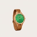 The AURORA Collection breaths the fresh air of Scandinavian nature and the astonishing views of the sky. This light weighing watch is made of olive wood, accompanied by a green stainless-steel dial with golden details.<br />
Comes with a cactus leather strap in