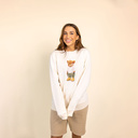Soft unisex long-sleeved sweater with a round neck. Made of 85% organic cotton and 15% recycled polyester, featuring a full body Harvey print.