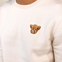 Soft unisex long-sleeved sweater with a round neck. Made of 85% organic cotton and 15% recycled polyester, featuring embroidered Harvey logo.