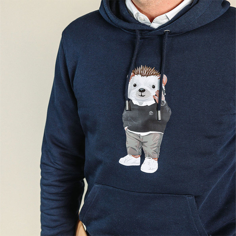 Soft unisex long-sleeved hoodie with a double layered hood and a kangaroo pocket at the front. Made of 85% organic cotton and 15% recycled polyester, featuring a full body Harvey print.