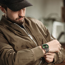 The Open-heart Pure Green is made of Chacate Preto and features a green dial with steel metal details.