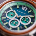 Apex Elite: Sophisticated wooden watches for men. Features Japanese Movement, chronograph, stainless steel, natural wood, green dial. Durable and stylish.