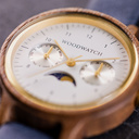 The Selene Blue Dream is crafted from walnut wood, featuring a white dial, navy blue vegan strap, and golden details.