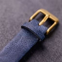The Selene Blue Dream is crafted from walnut wood, featuring a white dial, navy blue vegan strap, and golden details.