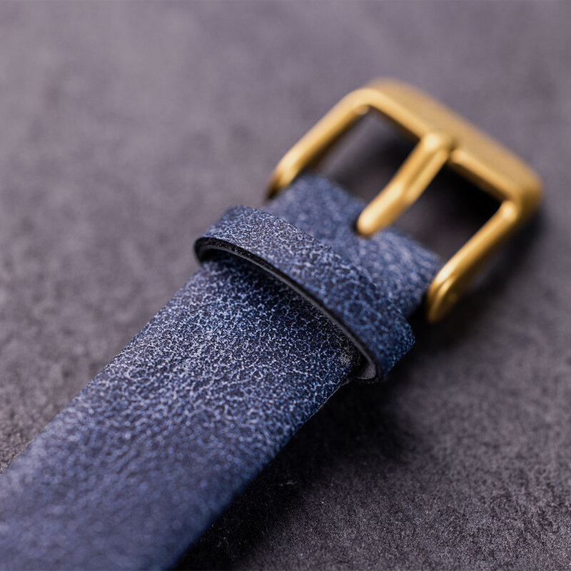 The Selene Blue Dream is crafted from walnut wood, featuring a white dial, navy blue vegan strap, and golden details.