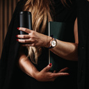 The Selene Raspberry Royale is crafted from walnut wood, featuring a pink dial, violet vegan strap, and golden details.