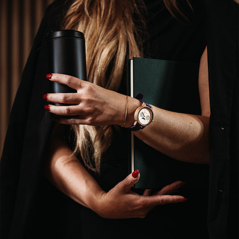 The Selene Raspberry Royale is crafted from walnut wood, featuring a pink dial, violet vegan strap, and golden details.