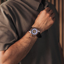 The Nostalgia Espresso is crafted from walnut wood and stainless steel, featuring a matte blue dial, dark brown vegan leather strap, and brushed silver metal details.