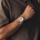 The Nostalgia Desert is crafted from walnut wood and stainless steel, featuring a beige dial, light brown vegan leather strap, and brushed silver metal details.