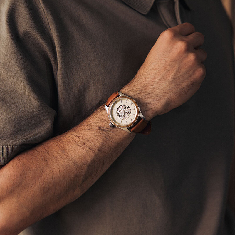 The Nostalgia Desert is crafted from walnut wood and stainless steel, featuring a beige dial, light brown vegan leather strap, and brushed silver metal details.