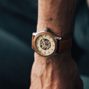 The Nostalgia Desert is crafted from walnut wood and stainless steel, featuring a beige dial, light brown vegan leather strap, and brushed silver metal details.
