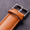 The Nostalgia Desert is crafted from walnut wood and stainless steel, featuring a beige dial, light brown vegan leather strap, and brushed silver metal details.