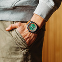 Verdant is made of Acacia wood, featuring a green dial.