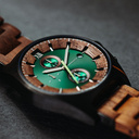 Verdant is made of Acacia wood, featuring a green dial.