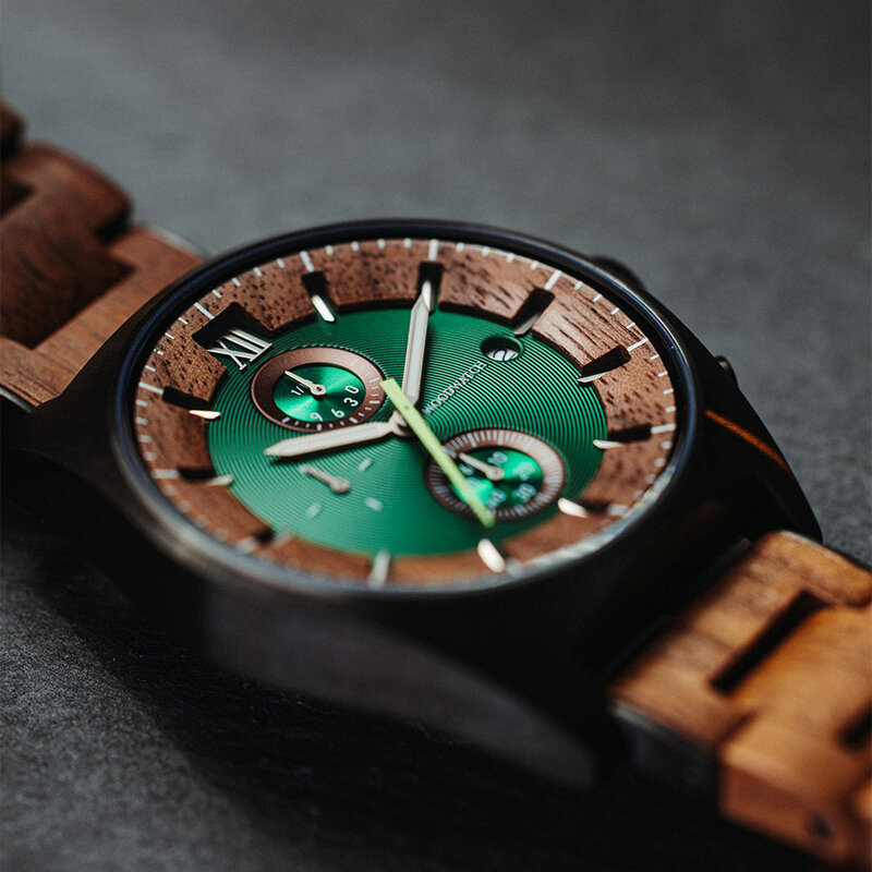 Verdant is made of Acacia wood, featuring a green dial.