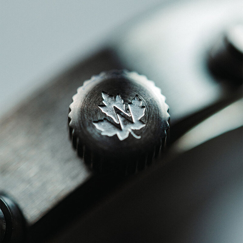 Phoenix is made of Black Sandalwood, featuring an orange dial.
