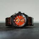 Phoenix is made of Black Sandalwood, featuring an orange dial.